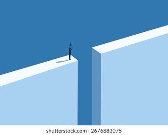 businessman stands in the gap and is thinking