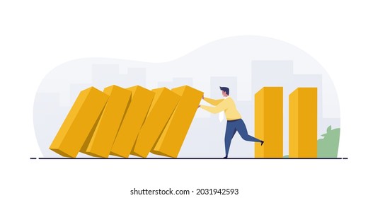 Businessman stopping falling domino effect.