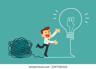 A businessman successfully transforms a messy complicated clew line into a creative lightbulb. Creative solution business concept.