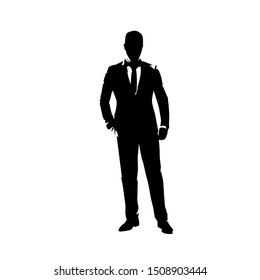 Businessman in suit standing and hand in pocket  abstract ink drawing vector silhouette  Man in suit