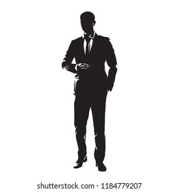 Businessman in suit standing with one hand in pocket. Isolated vector silhouette, front view. Business people