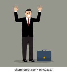 Businessman In A Suit Surrendering. Both Hands Up