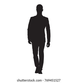 Businessman in suit walking forward, isolated vector silhouette