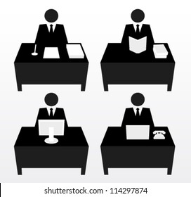 Businessman at table in office. Work and learning concept.