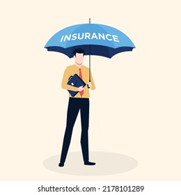 Businessman take cover under insurance umbrella