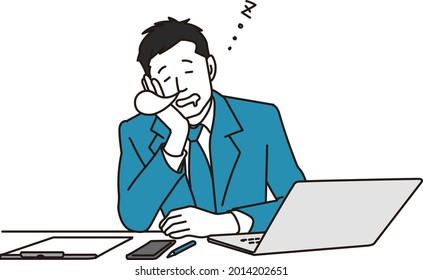 A businessman taking nap at desk work