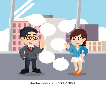 Businessman talking with businesswoman when break time in the office