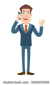 Businessman talking on mobile phone and showing a okay hand sign. Full length portrait of Cartoon Businessman Character. Vector illustration in a flat style.