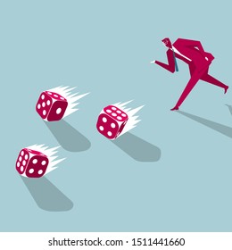 Businessman throws dices. Isolated on blue background.