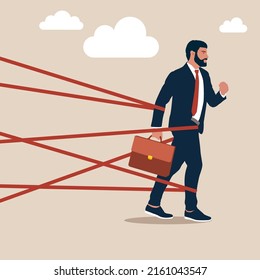 Businessman tied up with red tape trying to run away with full effort. Business difficulty or struggle with career obstacle, limitation and trap or challenge to overcome to success concept.