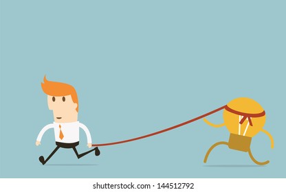 Businessman trying to catch idea