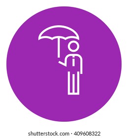 Businessman with umbrella line icon.