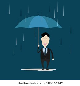 Businessman under an umbrella in the rain.