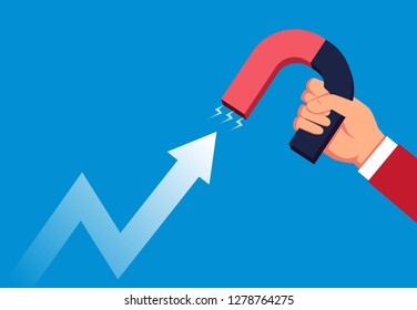 Businessman uses magnet to change arrow direction