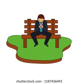 businessman using device on bench