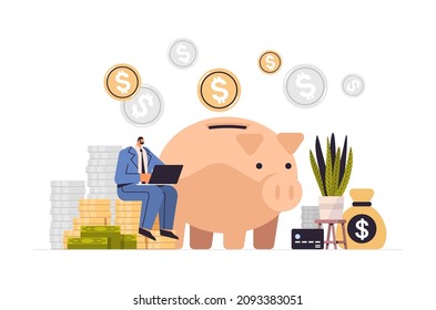 Businessman Using Laptop Near Piggy Bank Save Money Finance Analytics Wealth Accumulation Bank Deposit