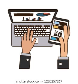 Businessman using laptop and smartphone