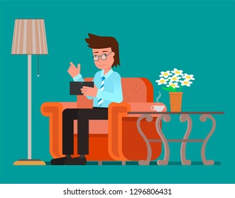 Businessman using tablet on the couch. Vector illustration, flat design drawing.