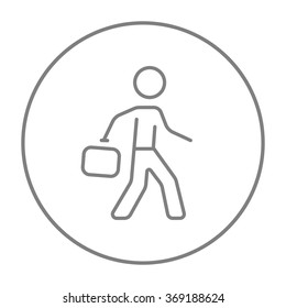 Businessman walking with briefcase line icon.