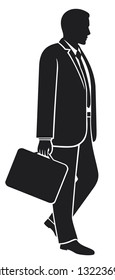 businessman walking with his briefcase 