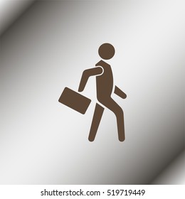 Businessman walking with his briefcase.