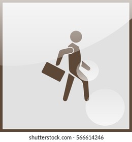 Businessman walking with his briefcase.