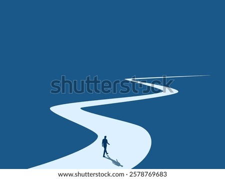 Businessman walking on the long career path ahead