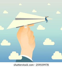 Businessman watching through telescope sitting on paper plane that hold with big-hand.