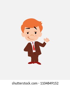 Businessman waving with a dreamy expression.