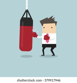 Businessman wearing boxing gloves and punching the punch bag