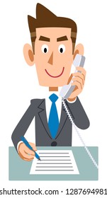 A businessman who takes notes while calling