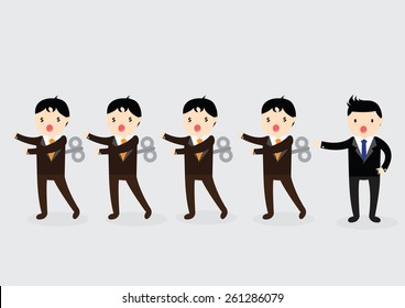 Businessman with wind-up key in his back 