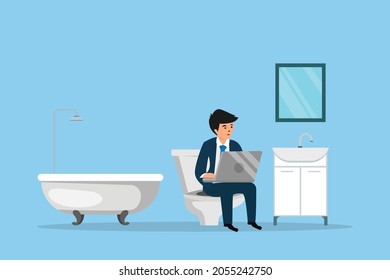 Businessman working with a laptop while relaxing in the bathroom