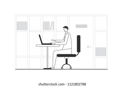 Businessman working on a laptop computer. Man on workplace. Man sitting on armchair.