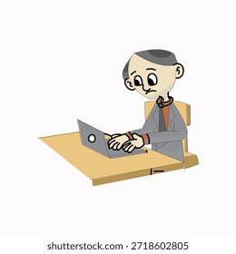 Businessman working on a laptop computer at his office desk