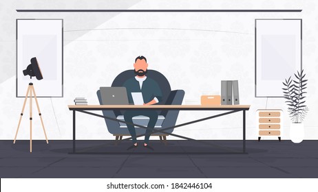 A businessman is working on a laptop in his office. Director's workplace. Laptop, documents, books, loft-style table. Vector.