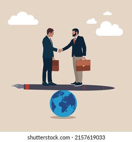 Businessman world leader handshake on fountain pen seesaw on world globe. Diplomacy, world agreement or treaty between countries, global partnership, politics or world peace contract signing concept.