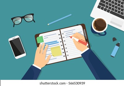 Businessman is writing down a note in the notebook or diary. Flat illustration of business man writing something on the paper. Professional manager sitting at work desk with laptop and drinking coffee