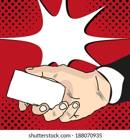 Businessman's hand holding blank paper business card or silhouette of mobile phone in pop art style comics book. Closeup isolated on white background 