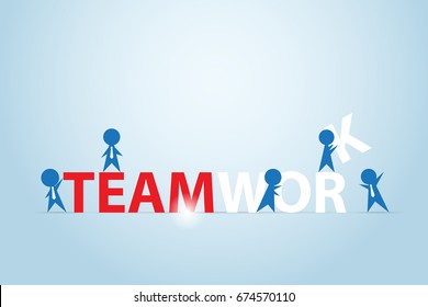 businessmen assembling the teamwork word, business concept