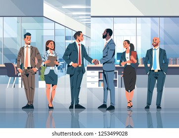 businessmen handshake agreement concept mix race business men teal leader cooperation partnership communication modern office interior cartoon character flat full length horizontal