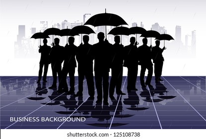businessmen under umbrellas against the city