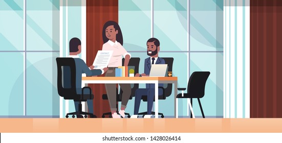 businesspeople discussing contract during business development meeting african american colleagues working with co-investment document negotiation concept office interior flat horizontal