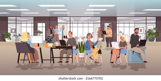 businesspeople discussing during meeting business people working together in modern office teamwork concept