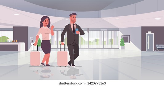 businesspeople with luggage couple standing at reception area business man woman holding suitcase contemporary lobby hotel hall interior flat horizontal full length