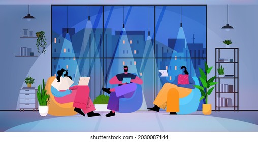 businesspeople using digital gadgets business people working in modern dark night office