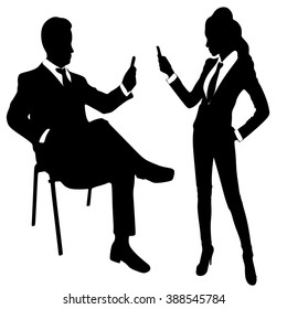 businesswoman and business man writing message on mobile phone