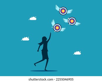 Businesswoman chasing a target that flies away from him. Failed goals and finding goals. business concept 