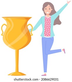 Businesswoman or clerk standing with cup in hand. Woman wins award, victory in competition. Business planning and development for success. Lady holds gold prize as symbol of victory, achievement