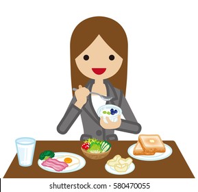 Businesswoman eating  Breakfast